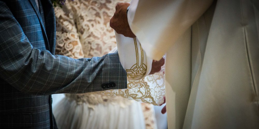 bride and groom during the wedding ceremony in church