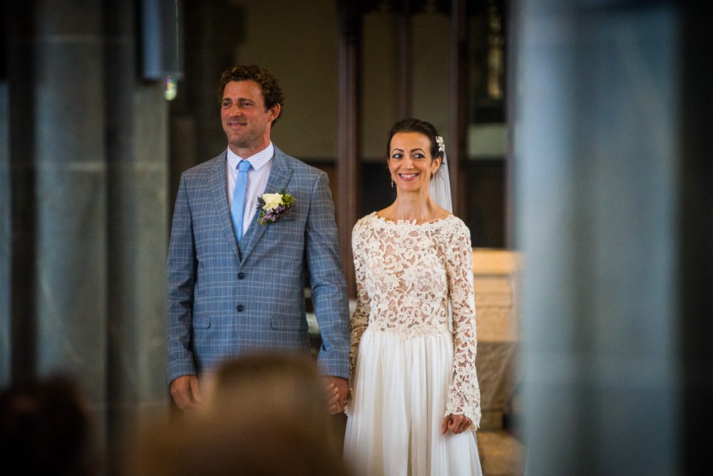 bride and groom during the wedding ceremony in church