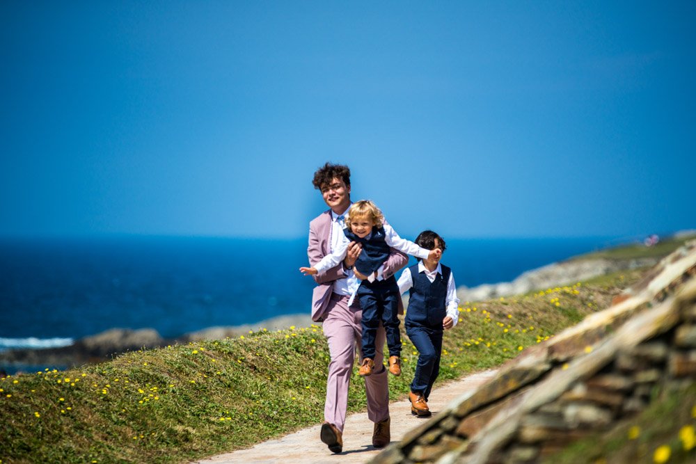 wedding guests on the coastpath Newquay cornwall