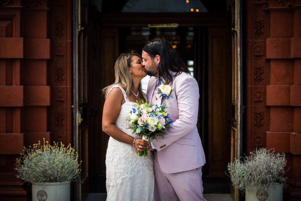 bride and groom at the church doorway in Newquay cornwall