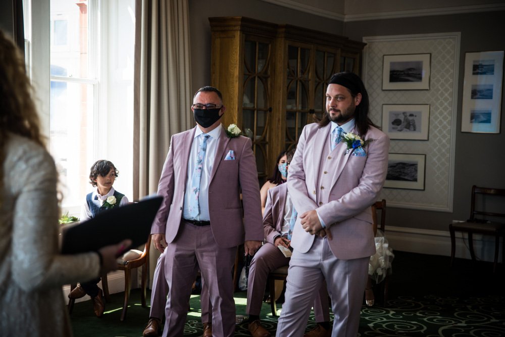 best man and groom waiting for the bride at the wedding ceremony