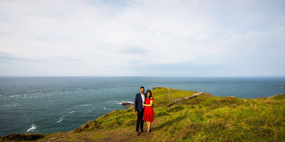 couple on the coastpath Tintagel cornwall