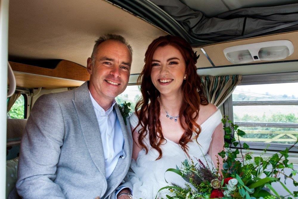 bride with father in a vw camper van
