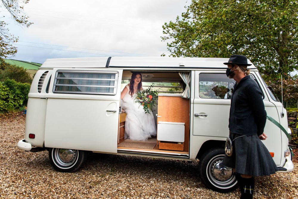 Bride in VW camper van wedding transport