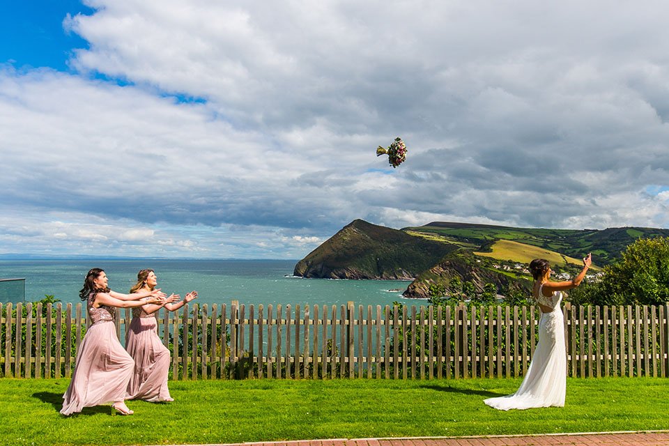 bridal bouquet toss at The sandy cove hotel Devon