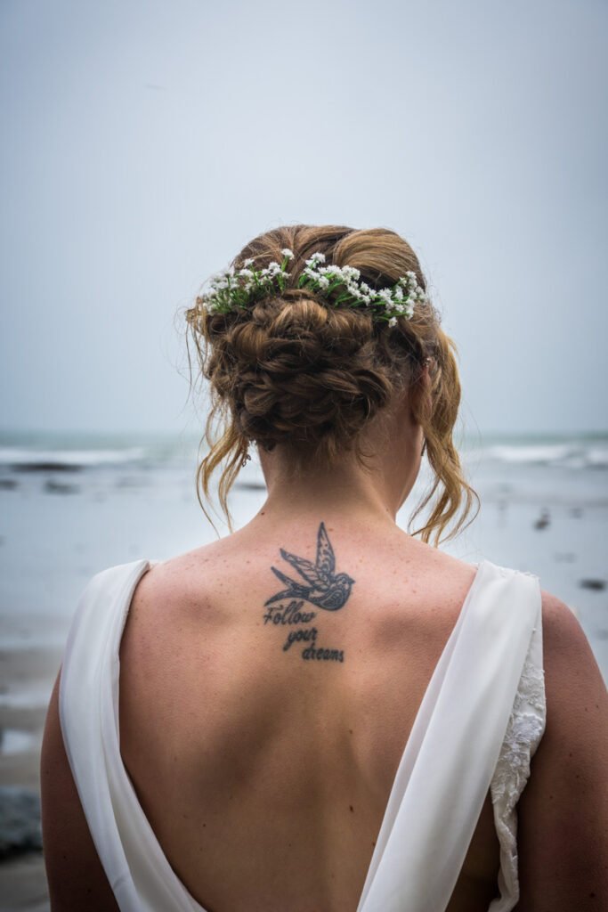 bride on the beach at St Michaels Mount cornwall