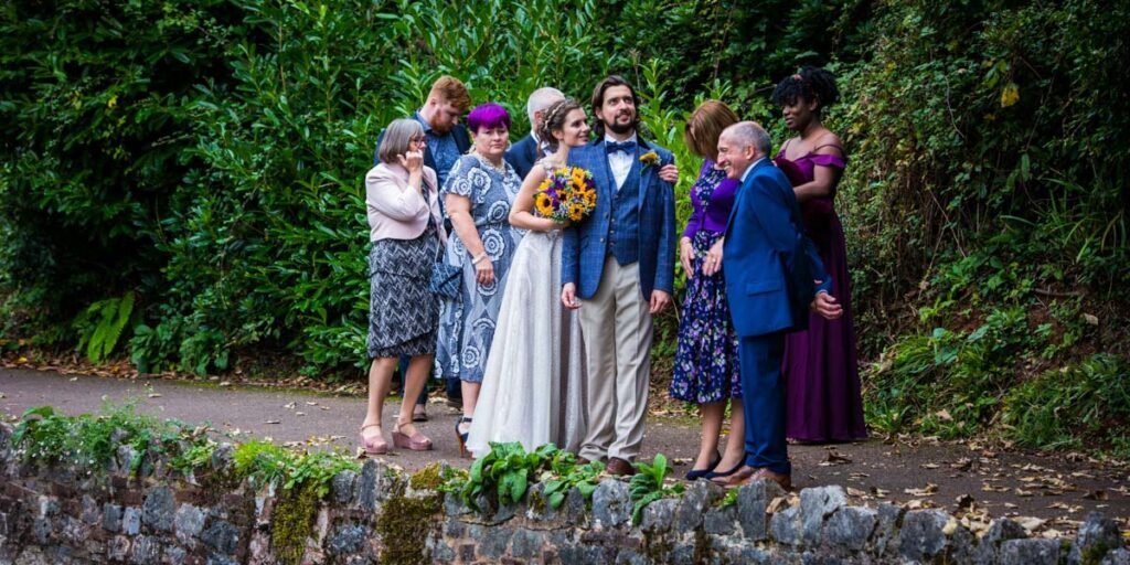 casual wedding group shot at Cockington country park Devon