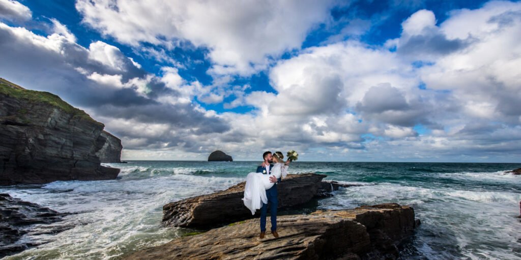 Bride and groom on the beach at Trebarwith Strand Cornwall