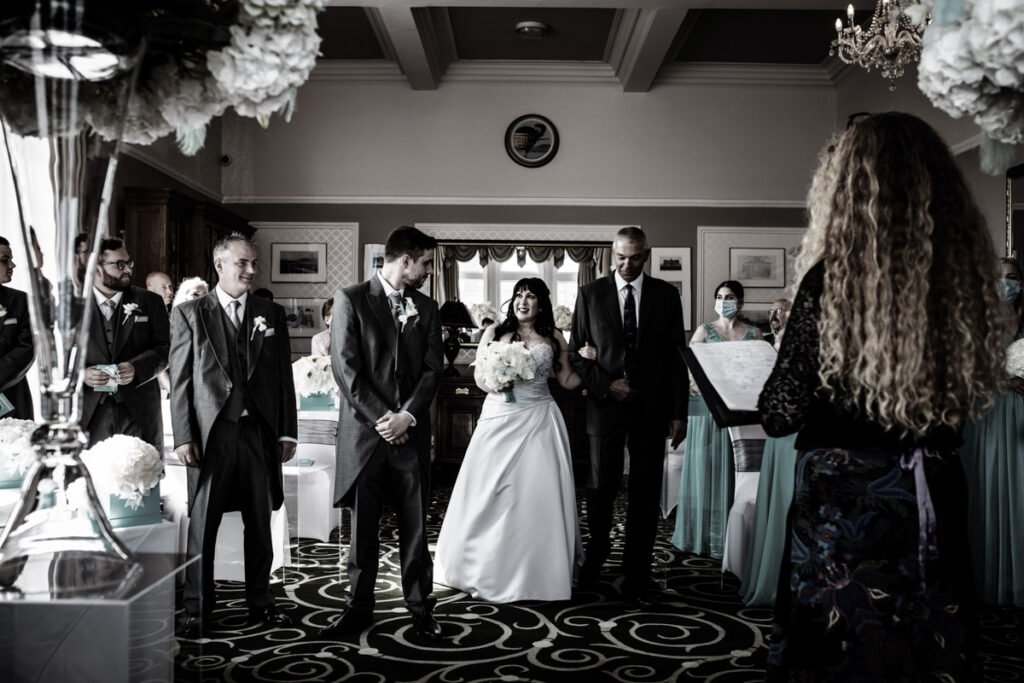 Bride and groom during the wedding ceremony at The Headland Hotel Newquay cornwall