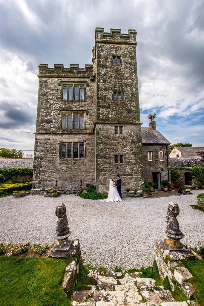 Bride and Groom outside Pengersick Castle