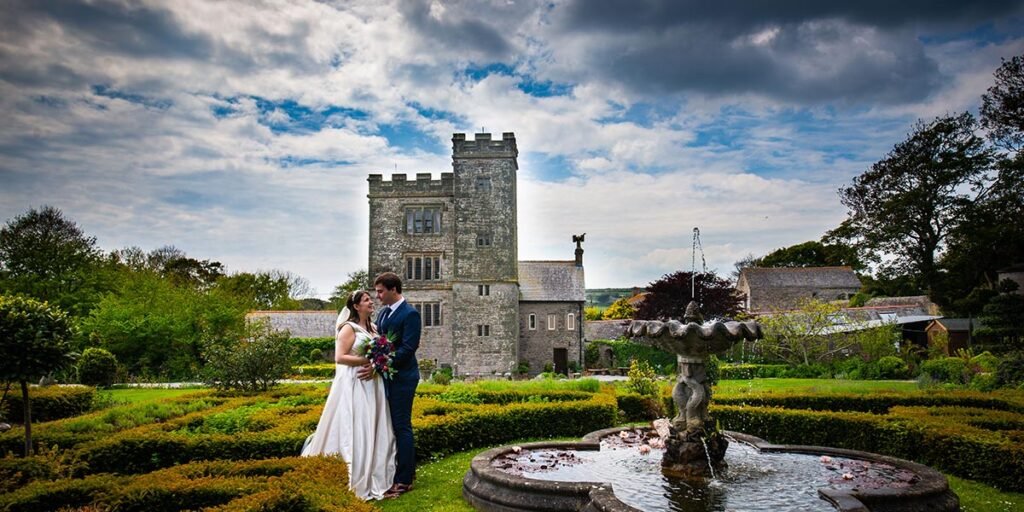 Bride and Groom in the gardens at Pengersick Castle