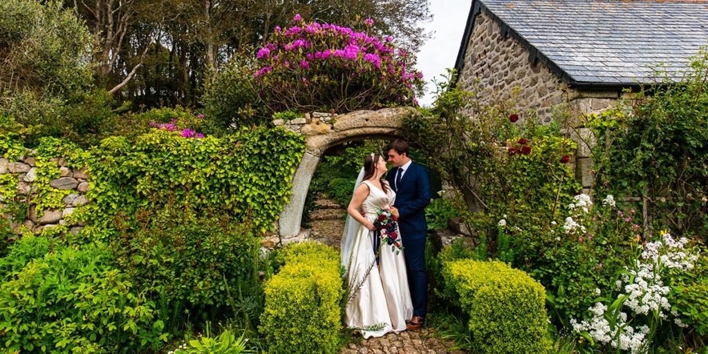 Bride and Groom in the gardens at Pengersick Castle