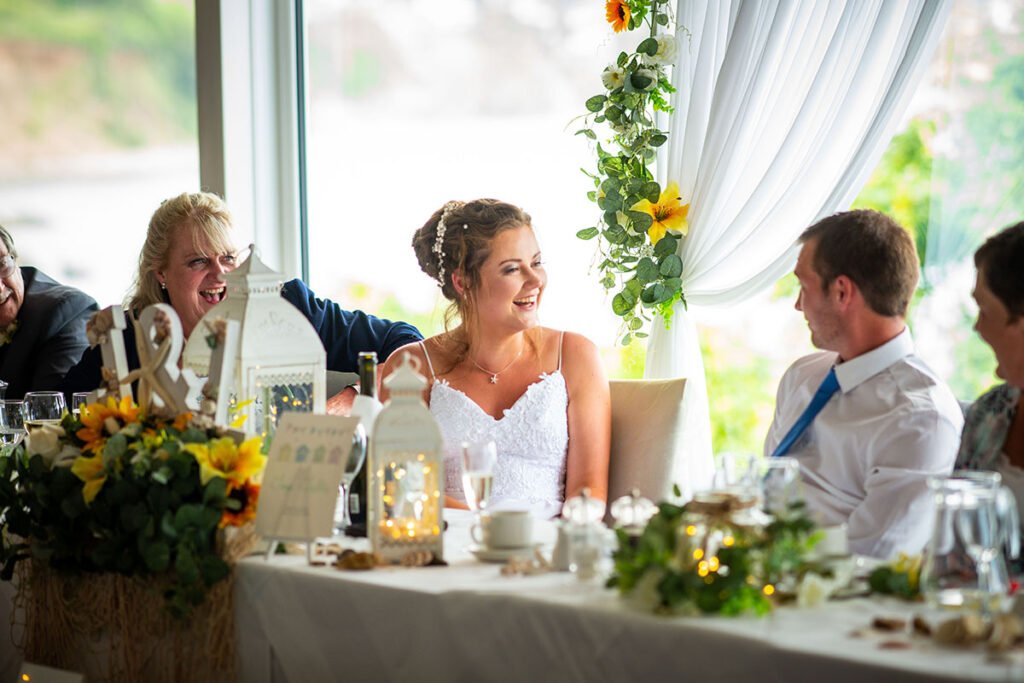 Bride laughing during the wedding reception