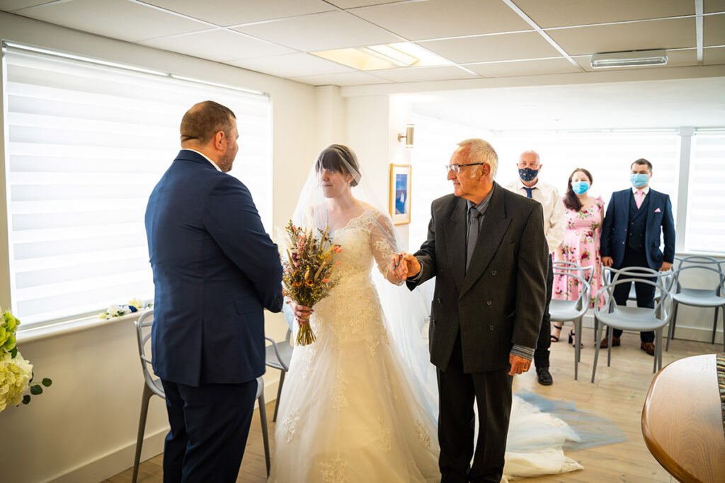 father giving away bride in bude Cornwall cornwall