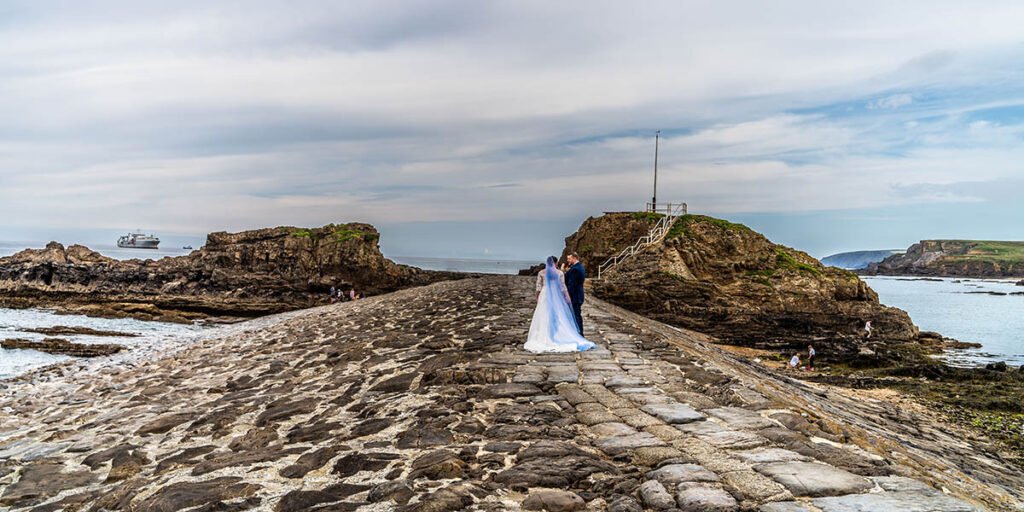 bride and groom at Bude Breakwater Cornwall