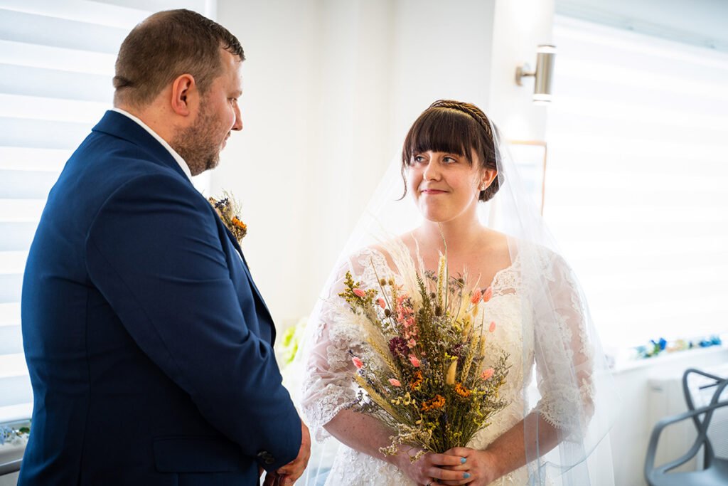 Bride and Groom during the wedding ceremony in bude Cornwall cornwall