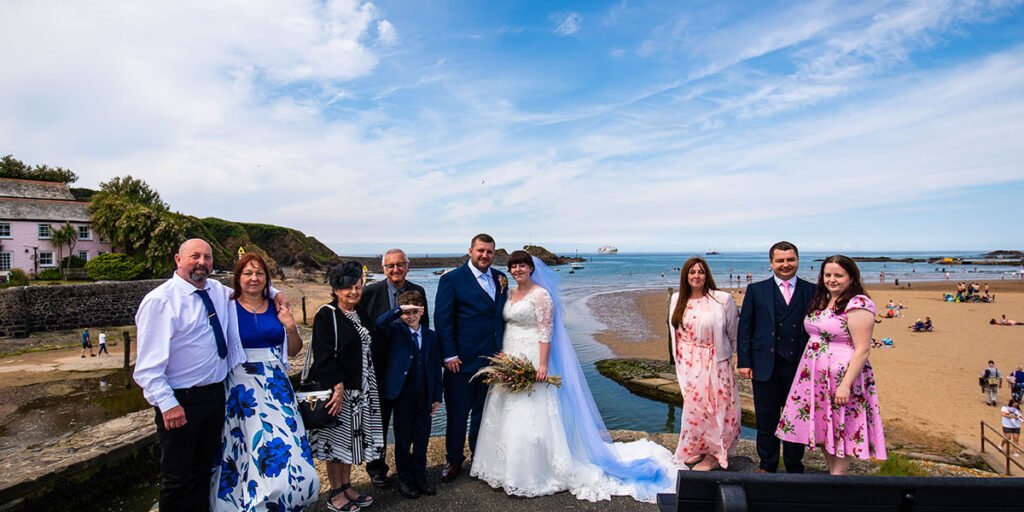 wedding group shot at the beach in Bude Cornwall