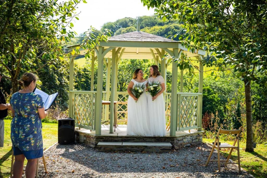 bride and bride after the ceremony at Pengenna Manor Cornwall