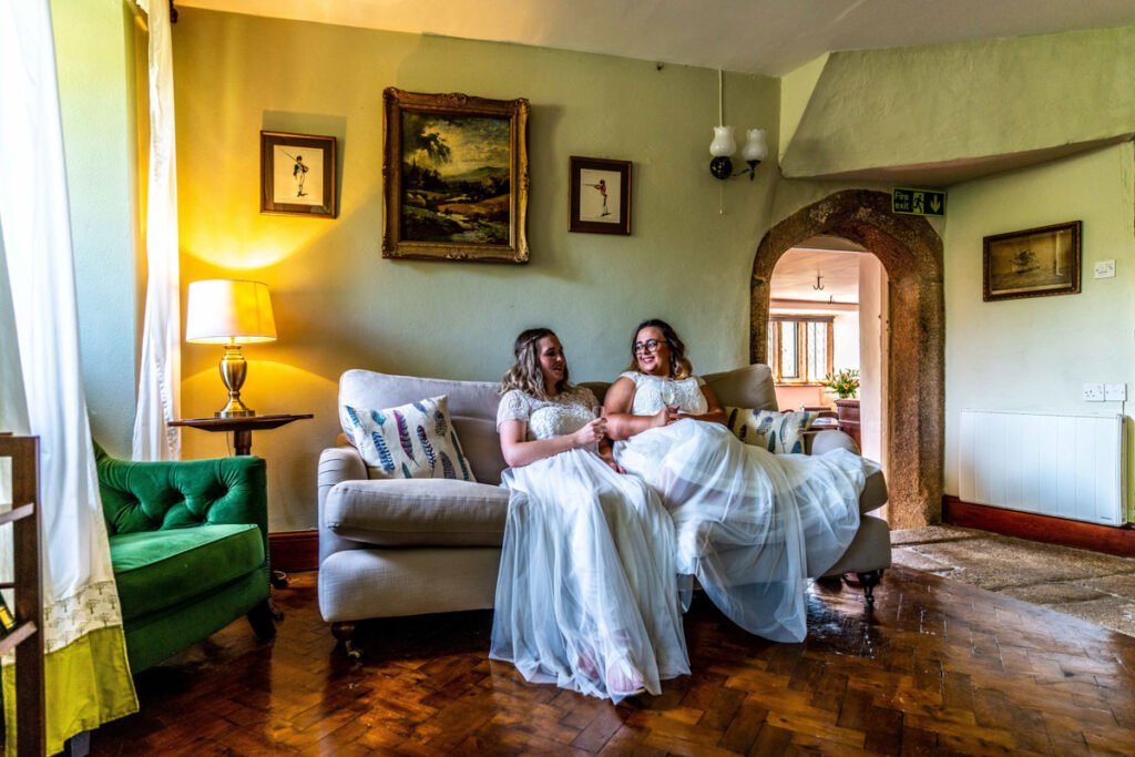 bride and bride in the house at Pengenna Manor Cornwall