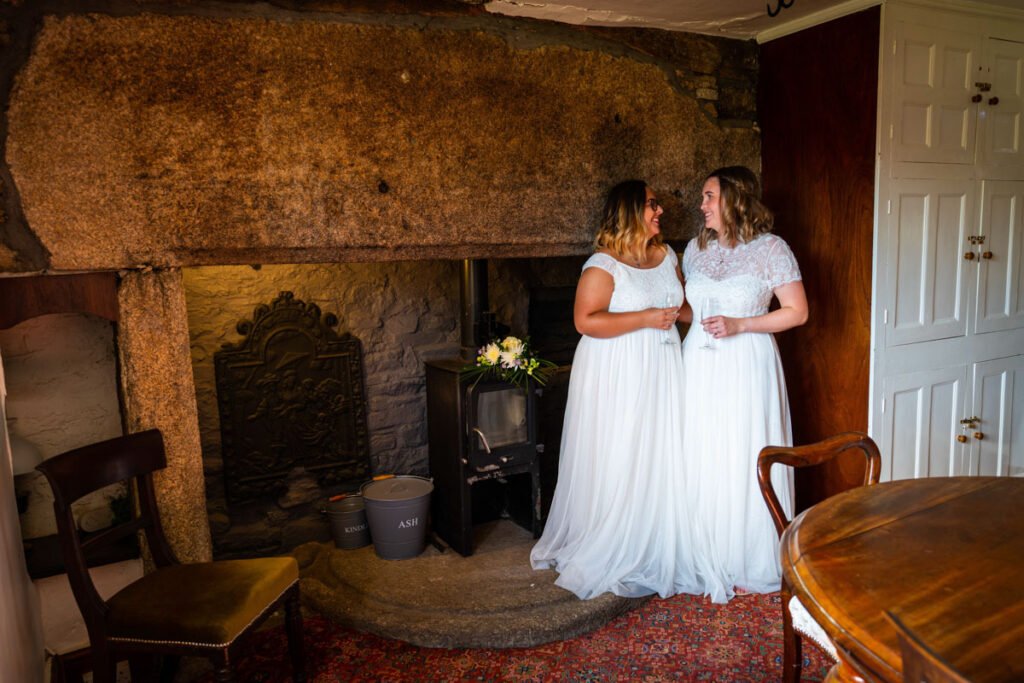 bride and bride in the house at Pengenna Manor Cornwall