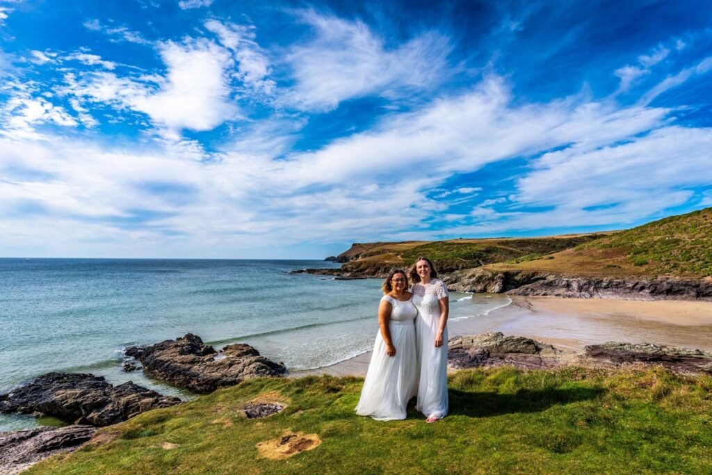 bride and bride at Polzeath beach Cornwall