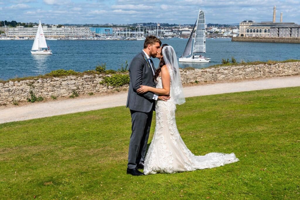 bride and groom kissing at Mount Edgcumbe Park Cornwall
