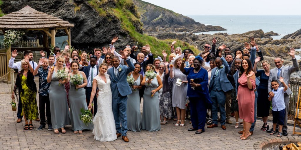 wedding group shot of everyone Tunnels beaches Ilfracombe Devon