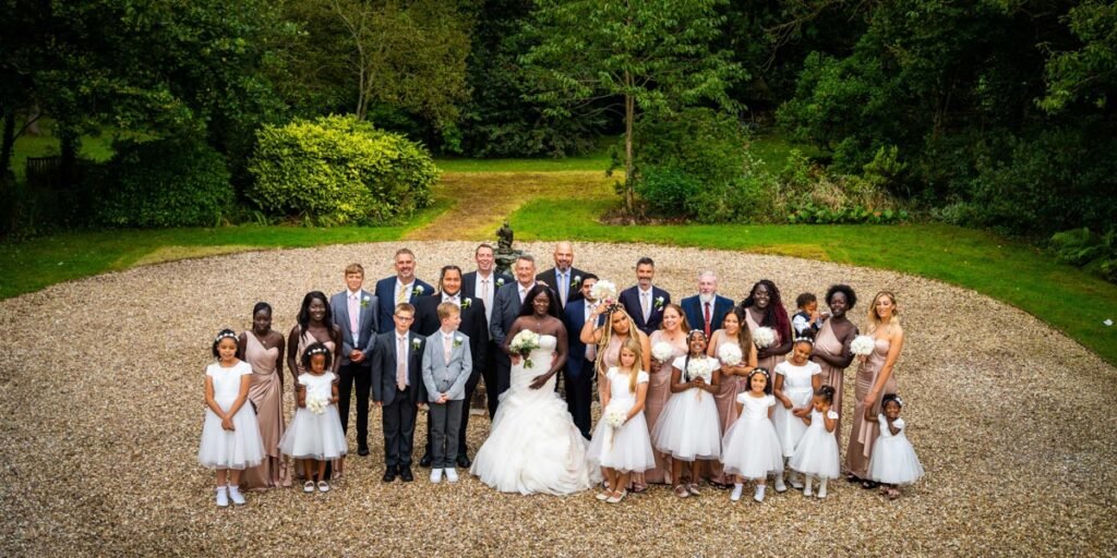 wedding group shot at glebe farm cottages devon wedding venue