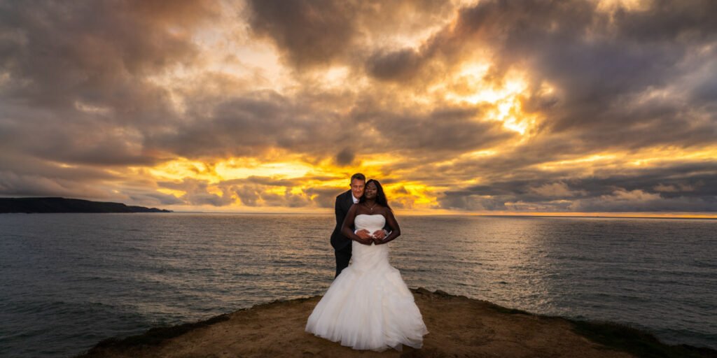 bride and groom sunset shot at Widemouth bay Cornwall