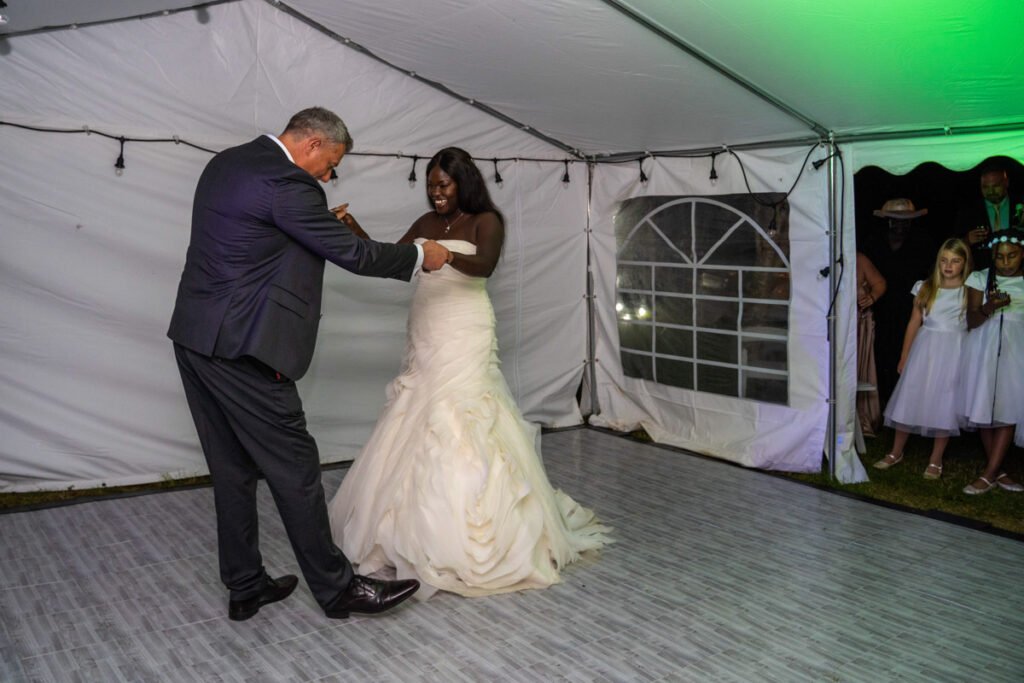 bride and groom dancing at the reception glebe farm cottages wedding venue devon