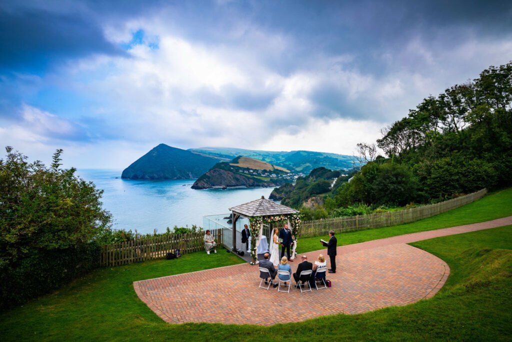 overhead shot of the wedding ceremony at devon wedding venue The Sandy cove hotel