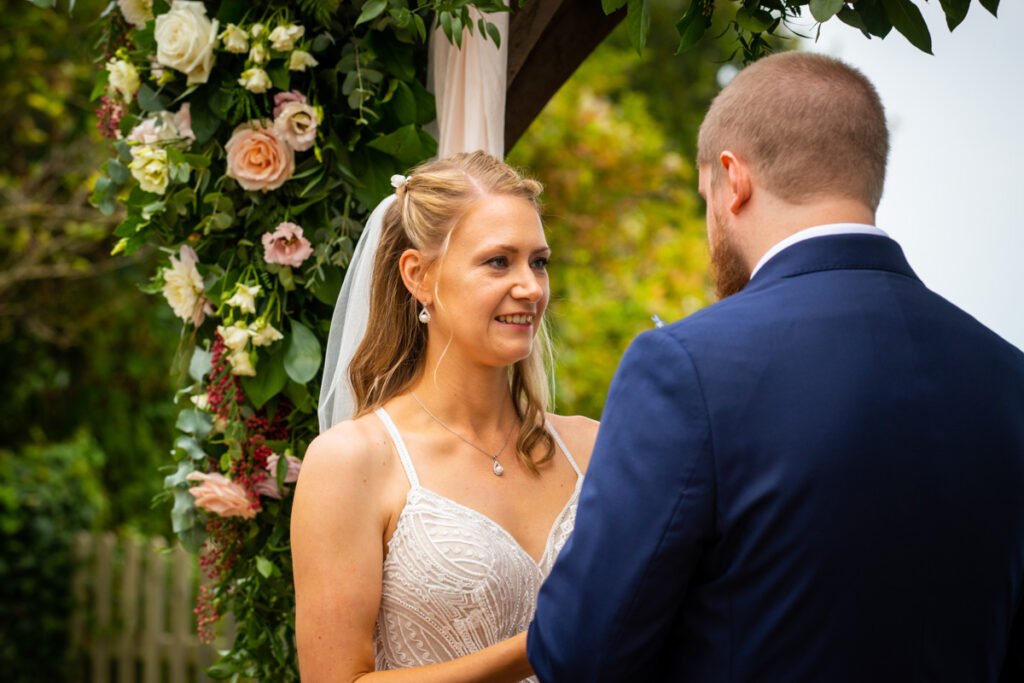 bride and groom ceremony vows at devon wedding venue The Sandy cove hotel