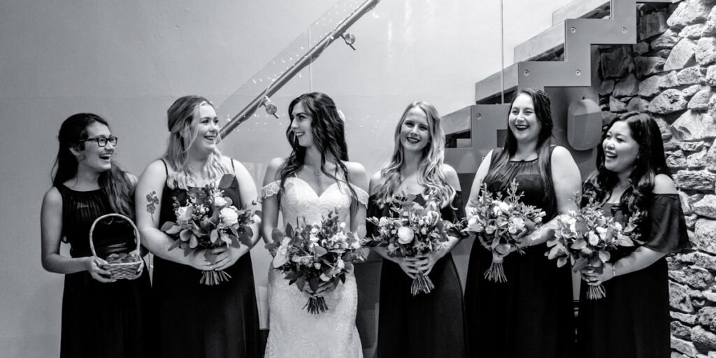 bride and bridesmaids at Trevenna Barns Cornwall B&W