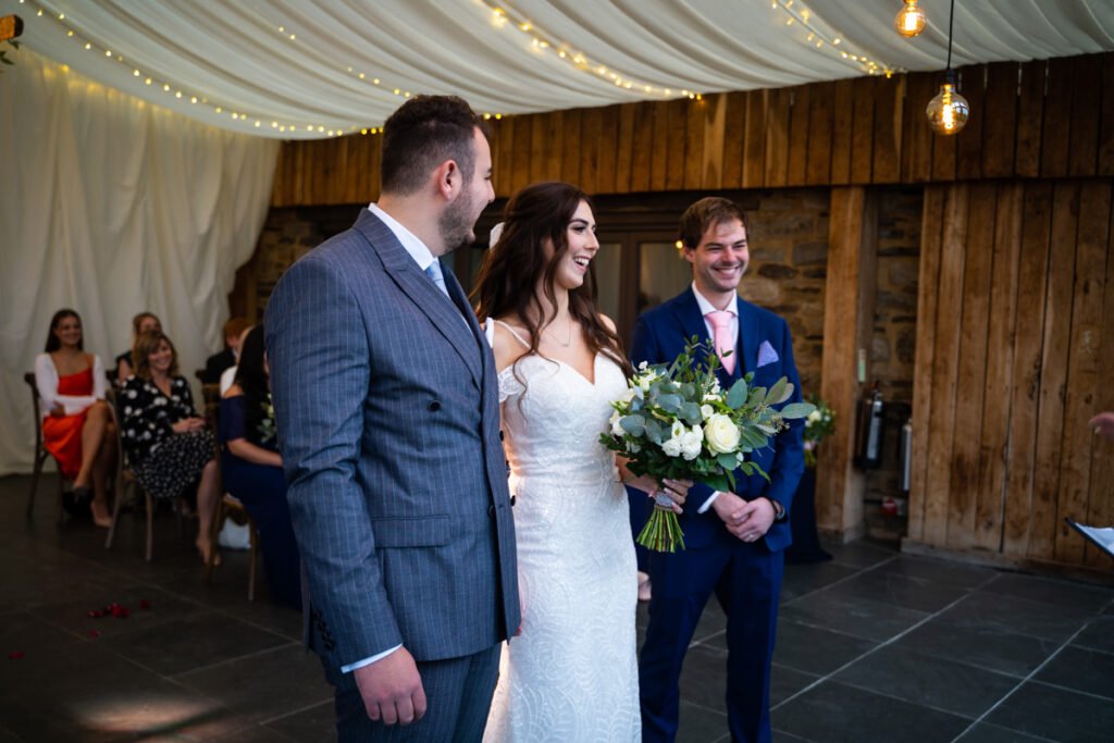 bride, groom and brother at Trevenna Barns Cornwall