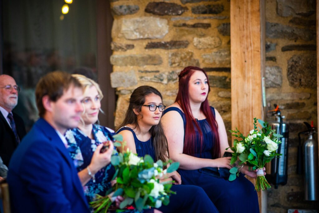 guests during the wedding ceremony at Trevenna Barns Cornwall