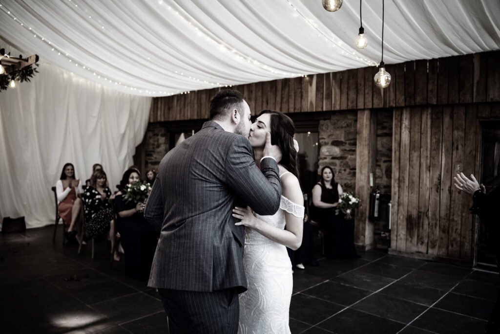 bride and groom 1st kiss at Trevenna Barns Cornwall