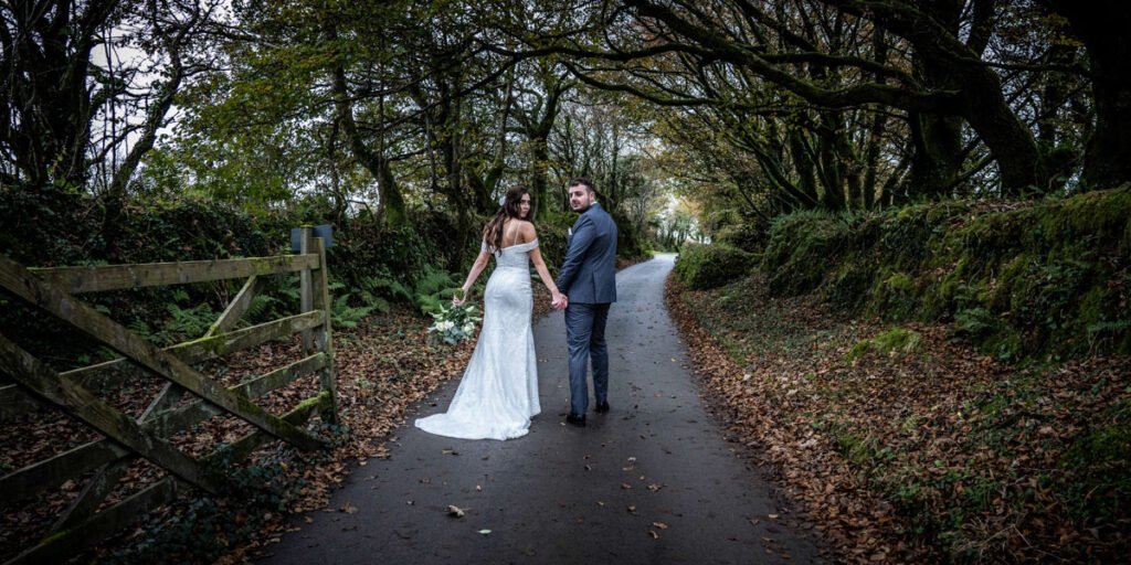 Bride and groom autumn at Trevenna Barns Cornwall