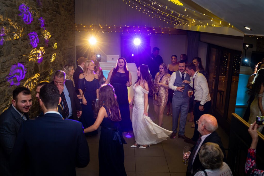 guests dancing at Trevenna Barns cornwall wedding venue