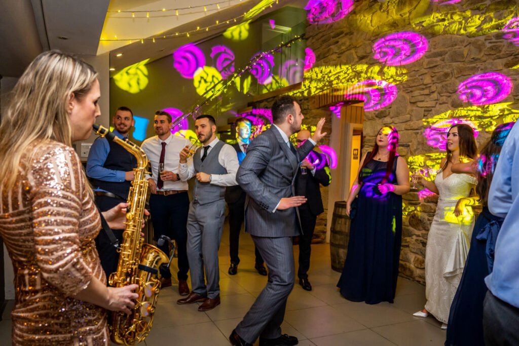 guests dancing at Trevenna Barns cornwall wedding venue