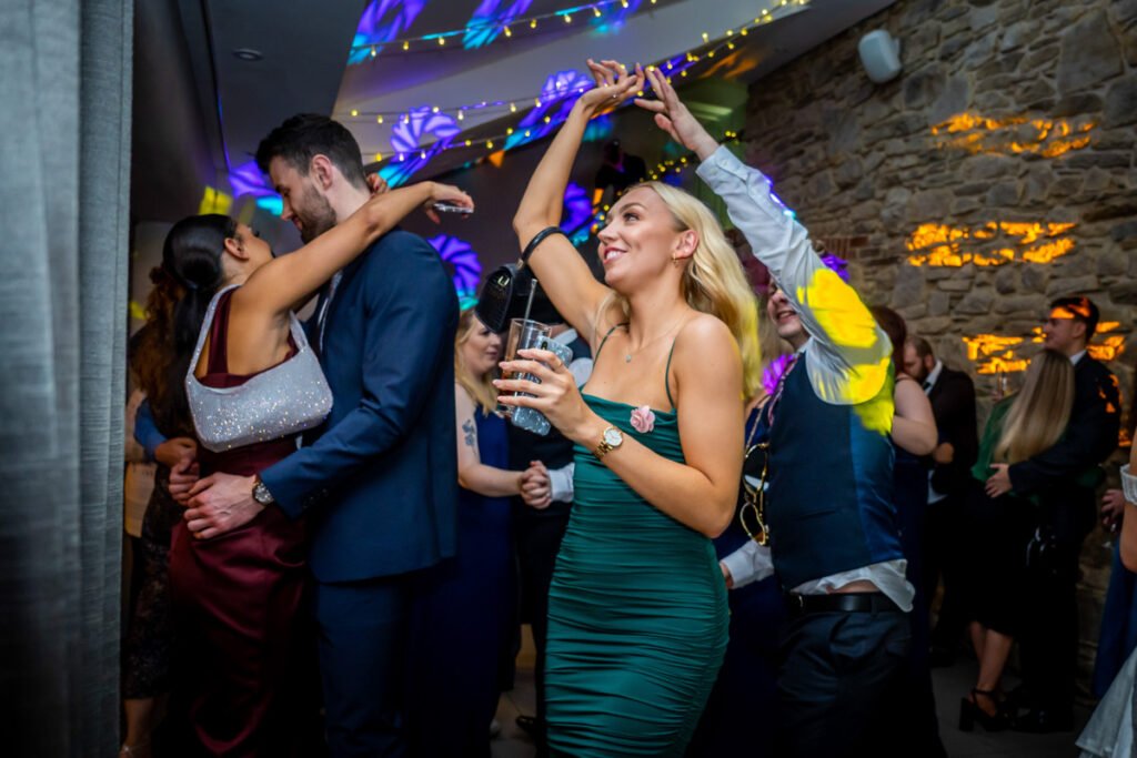 guests dancing at Trevenna Barns cornwall wedding venue