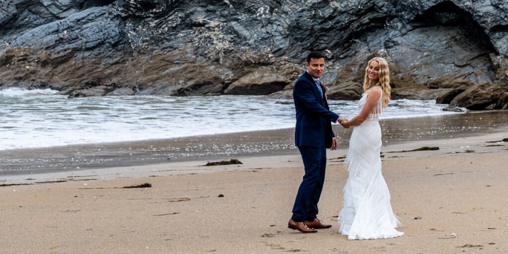 bride and groom portrait on the beach