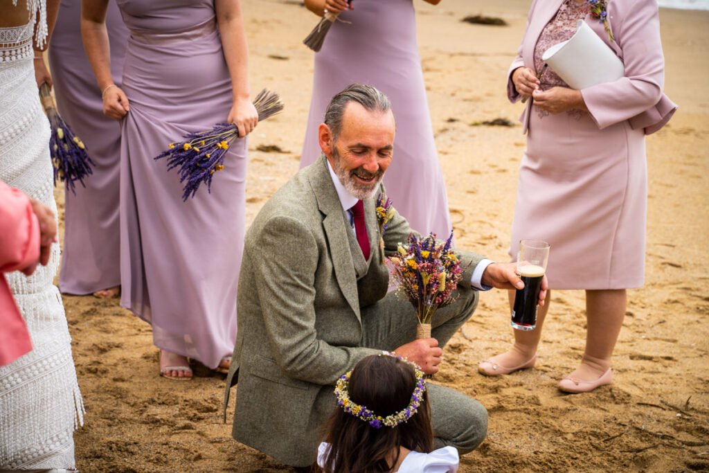 father of the bride at a beach wedding