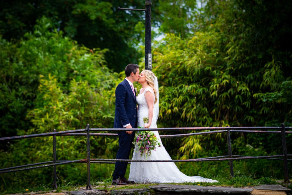 bride and groom on the bridge