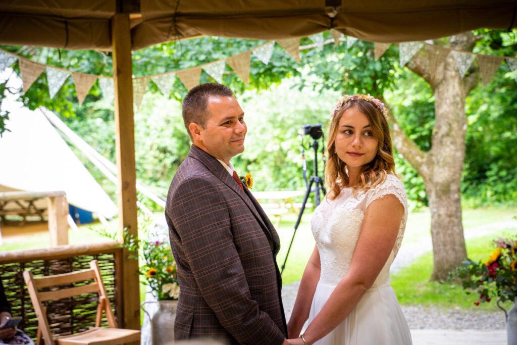 bride and groom wedding vows at cornish tipis in cornwall