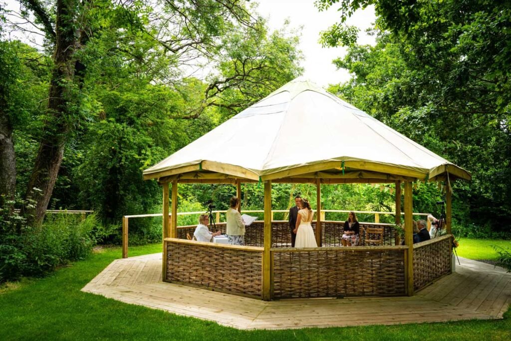 outdoor wedding ceremony at cornish tipis in cornwall