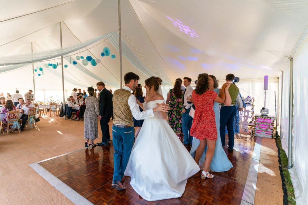 group dancing at a cornwall wedding