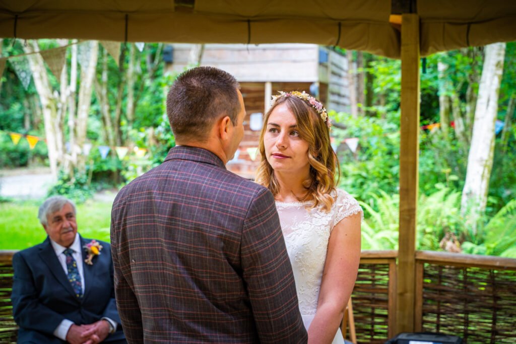 bride and groom wedding vows at cornish tipis in cornwall