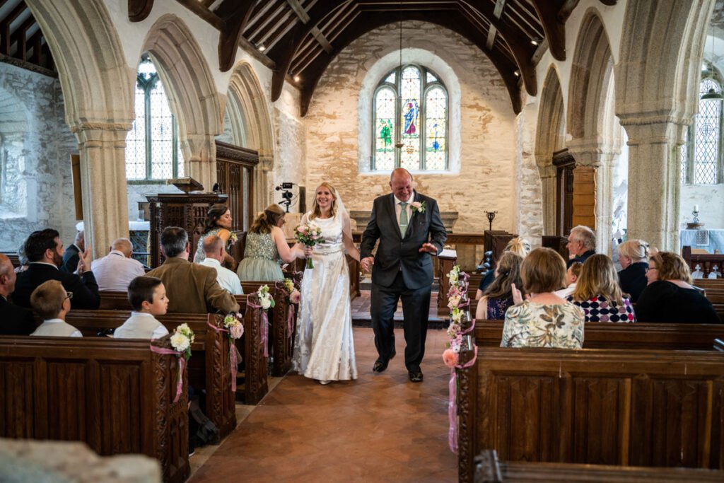 bride and groom leaving the ceremony