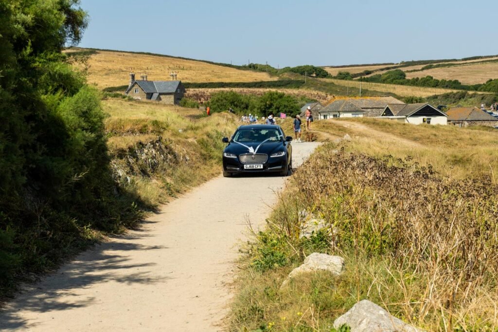 cornwall wedding car arriving at the church