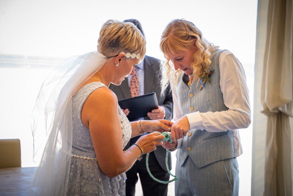 newquay same sex wedding bride and bride hand fastening